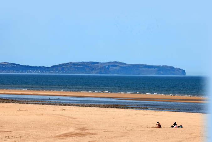 Girl saved from drowning by hero strangers after being dragged out to sea