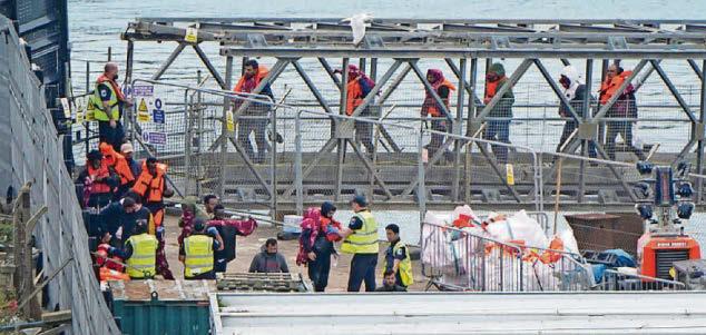 'First migrants' held under new deal as PM vows to secure border