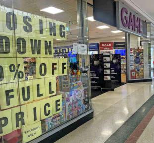 Fresh blow to city shoppers as firm shuts flagship shop