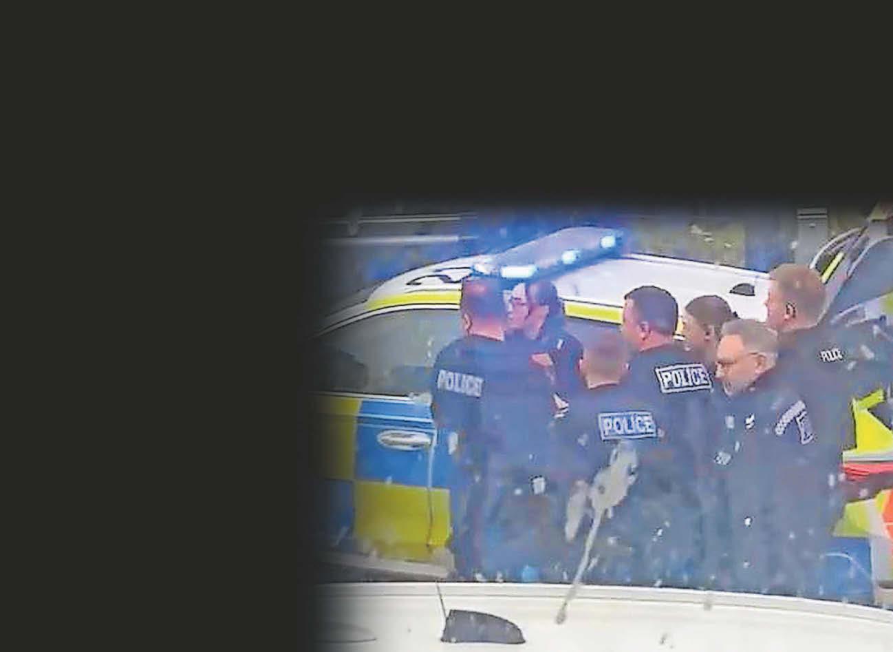 Knifeman was wrestled to ground after 'trying to get into cars' in city streets