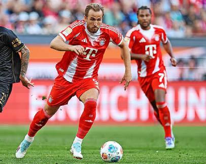 Kane supplies bullets to keep Bayern firing
