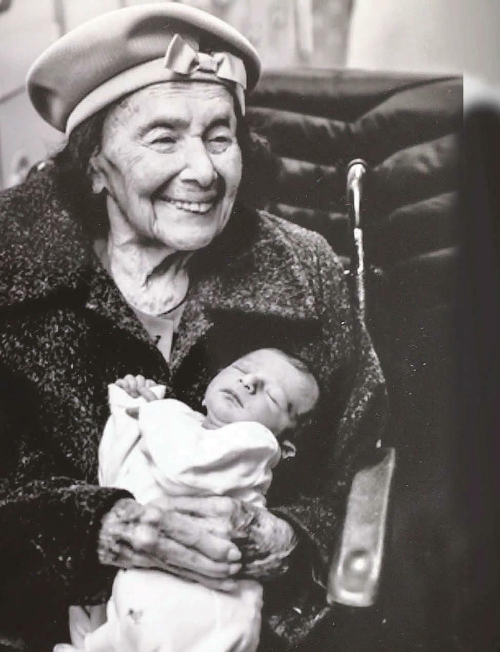 Auschwitz survivor's revenge... holding her great-great grandson