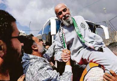 Israeli dads among freed hostages as prisoners let out
