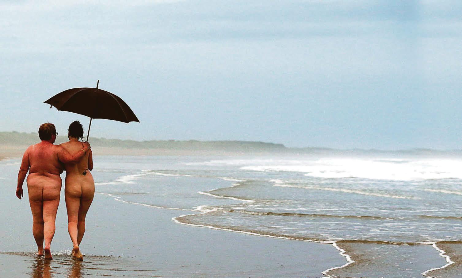 Bare we go! Council U-turn over beach ban on naturists