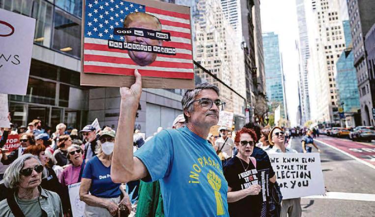 Millions of protesters march against Trump