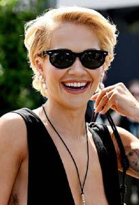 It's Formula fun for racy Rita as she roars into Melbourne GP