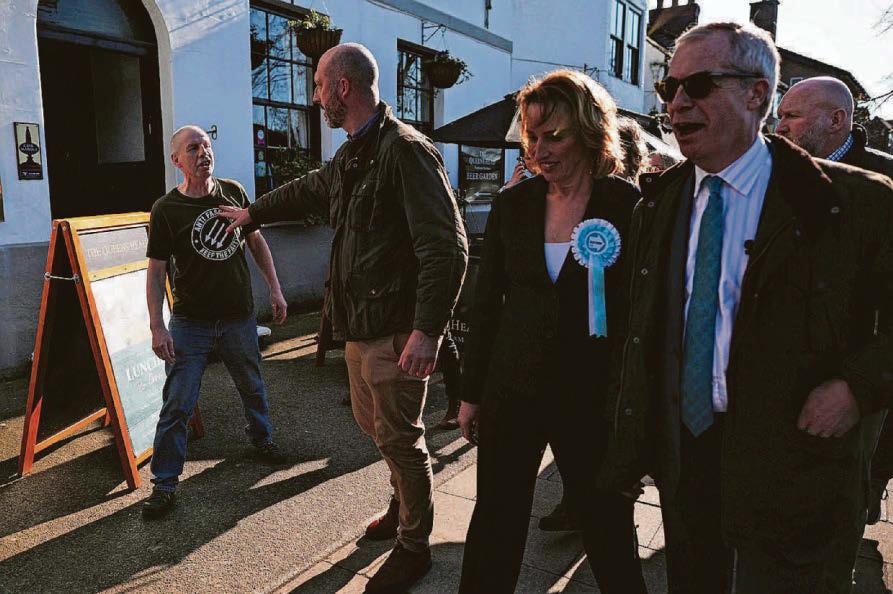 Farage heckled on by-election campaign trail