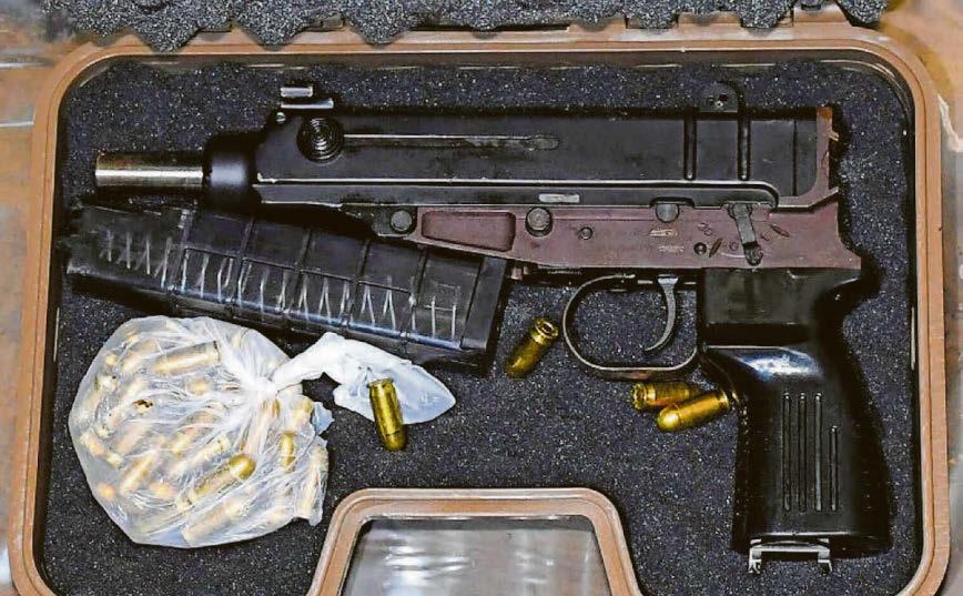 Skorpion sub-machine gun, drugs and cash found in police raid ...