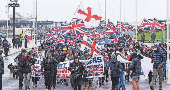 Chants of 'Nazi scum' as march meets opposition