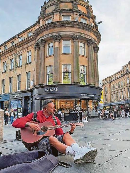 Toon legend spotted busking in city centre