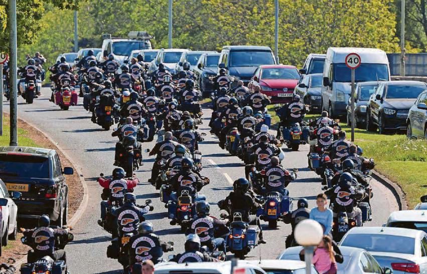 Thousands ride out in tribute to Hells Angel biker