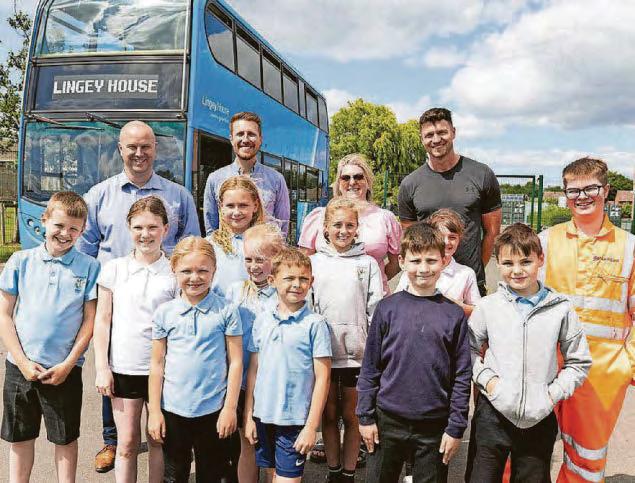 School children ready to board big surprise