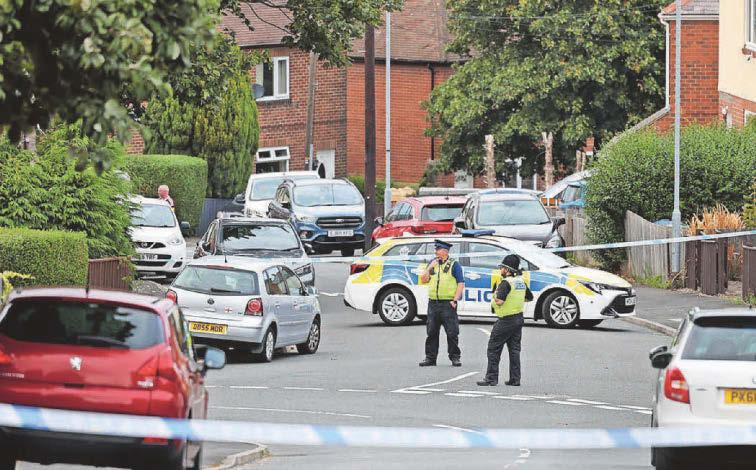 Armed police swoop as 'four loud bangs' heard
