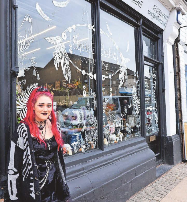 Vicar 'intimidated' me, says owner of new crystal store