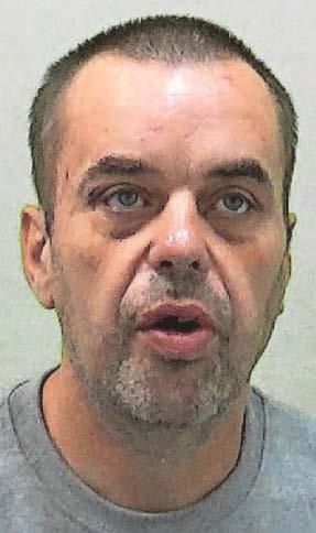 Charity shop robber tried to stab manager