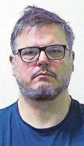 Head who 'loves young girls' had indecent pics