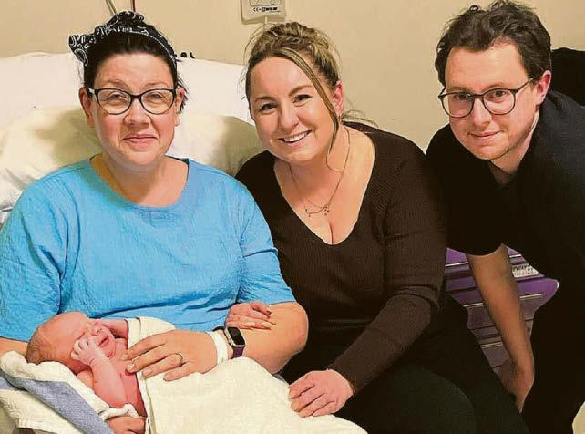 FAMILY'S JOY AT SURROGATE'S PRICELESS GIFT
