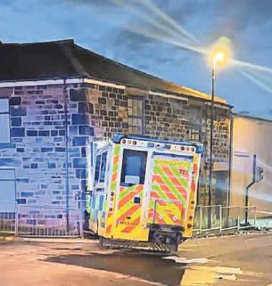 Ambulance crew in crash