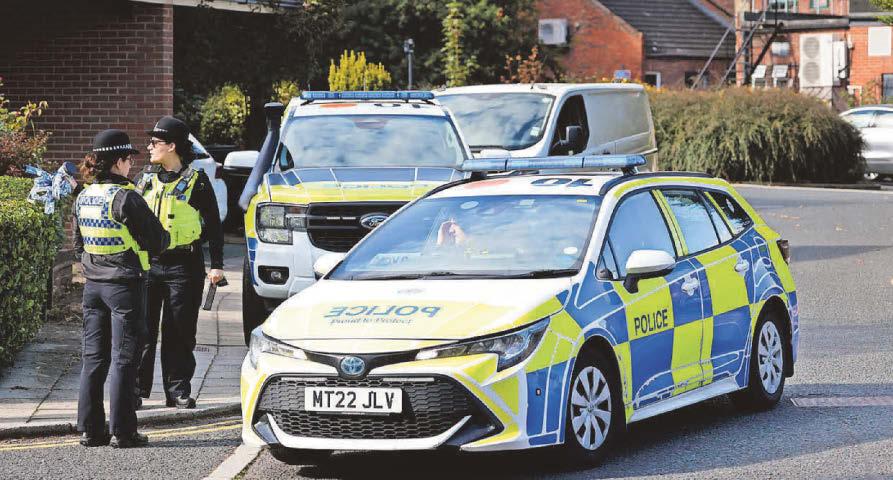 Bomb squad called to street as man is arrested