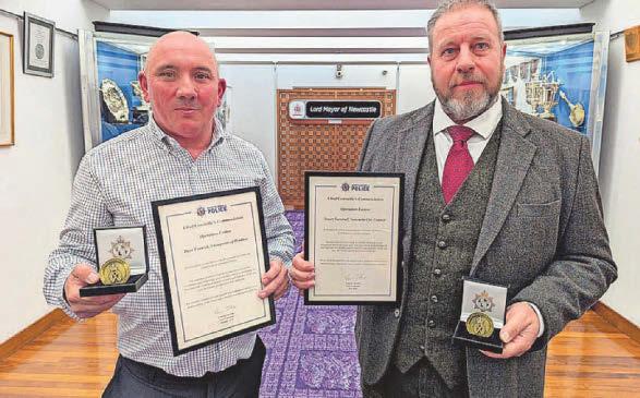 Pair honoured for actions after blast