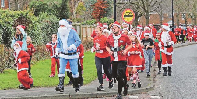 A sea of Santas and elves run to raise £1,500