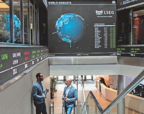 FTSE smashes 10,000 mark as Rolls-Royce and Fresnillo rally