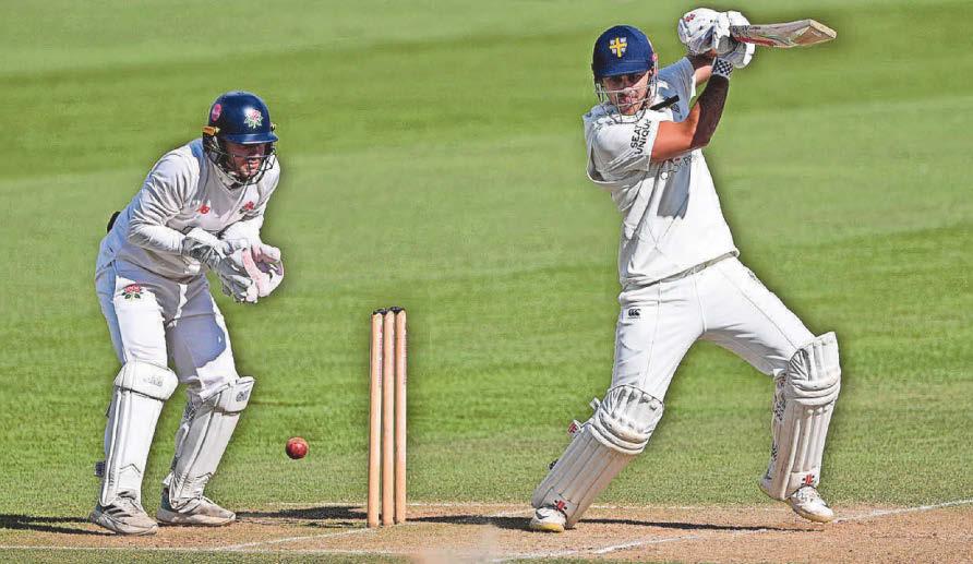 Durham ace back for another year