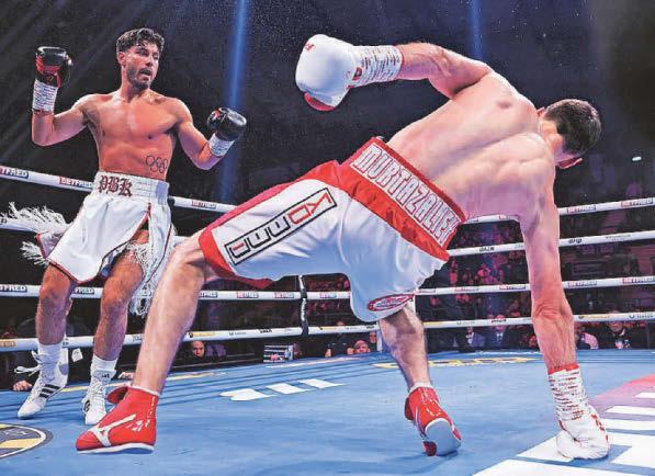 Kelly shocks much-fancied Russian to win world title
