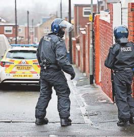 Police hold man after roof standoff