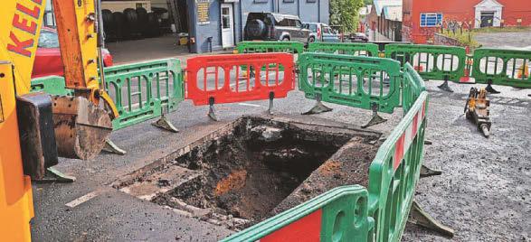Sinkhole that closed road is being repaired