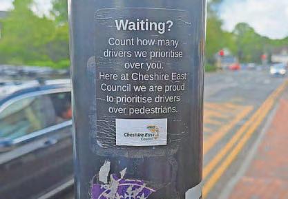 It's a stick-up as poster slams traffic light wait