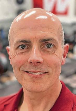 Lecturer who has helped elite athletes in running for prize