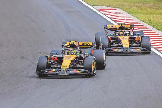 Norris boosts title chances with thrilling Hungary win