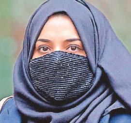 MP cries in Commons over ex-husband's alleged abuse