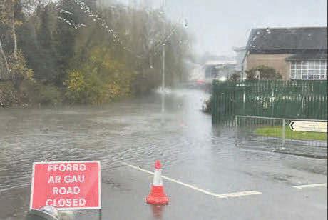 Barber is forced to flee as floods strike