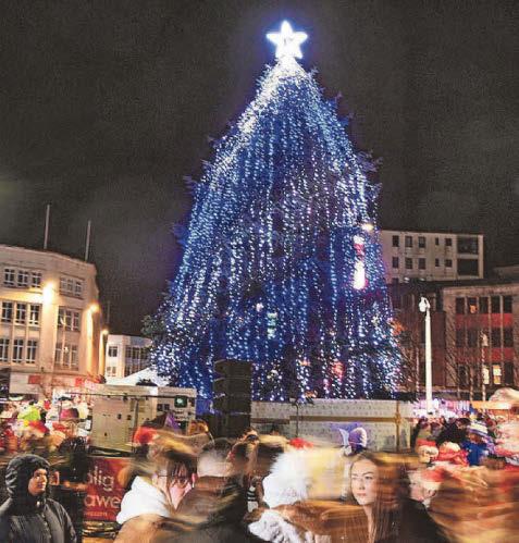 Parade helps city get into festive spirit