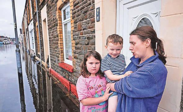 Little boy woke to water coming through front door and window
