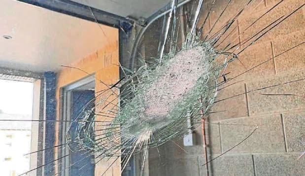 Kids covered in glass as stone thrown from m-way bridge