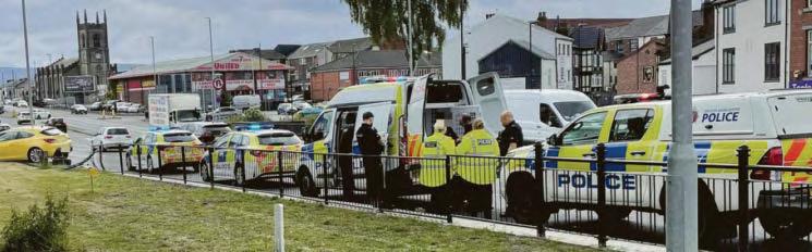 Police storm busy road after rush hour crash