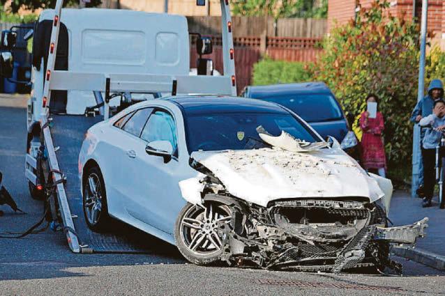 Car smashes into house