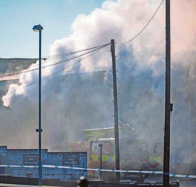 Stay away plea as blaze rages at storage company