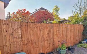 Fence dispute forcing widow to sell her house