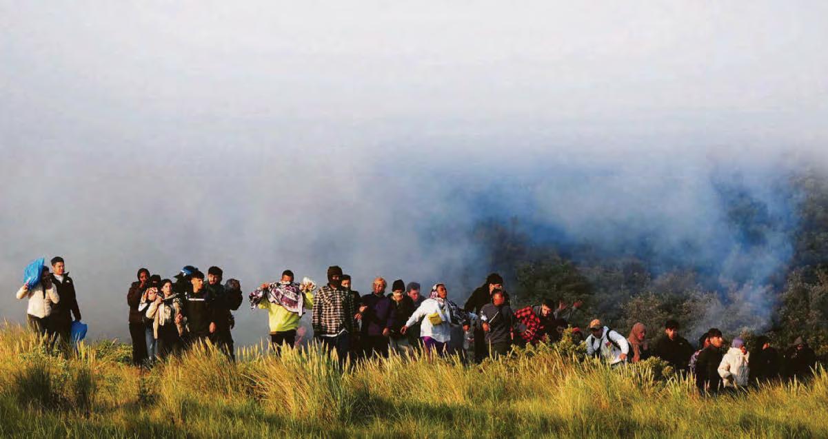 Police tear-gas migrants as Channel crisis deepens