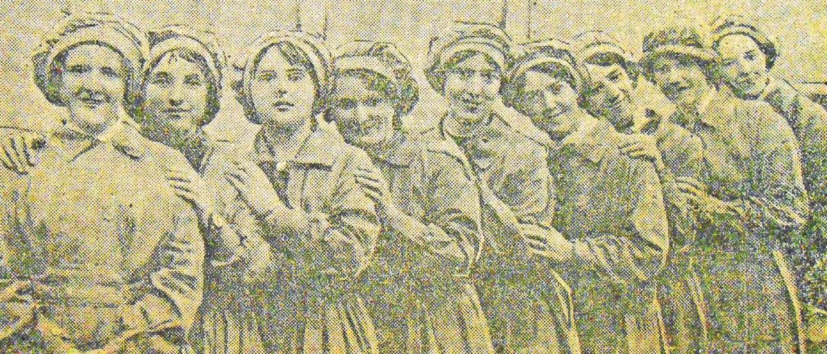 Call for help in identifying women in WWI munitions factory photos