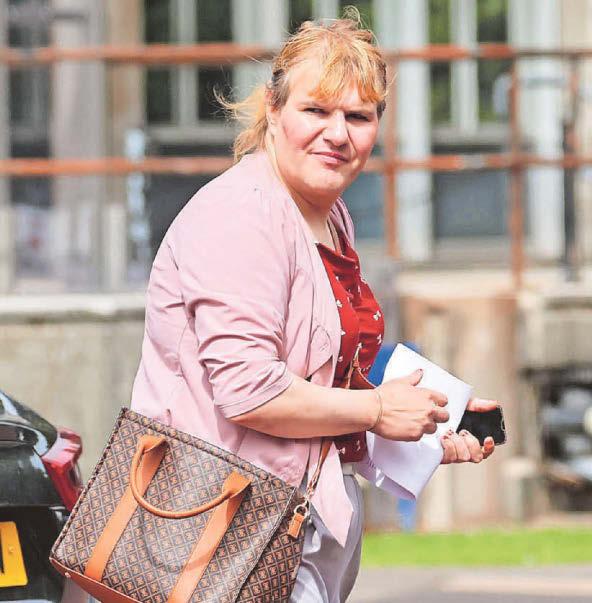 Ex-MP faces false passport charge