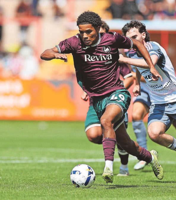 SWANS LEAD RACE TO SIGN STRIKER OLI