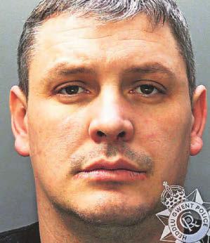 Dog walker left trapped under car