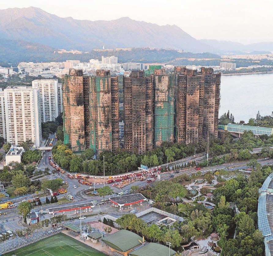 Arrests over Hong Kong apartment towers blaze