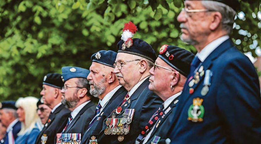 Emotional scenes at poignant celebration of war effort