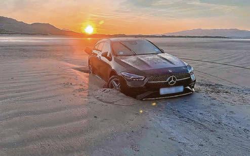 Days at sea for hire car stuck on beach